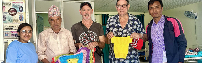 photo of Jonathan donating goods to maternity hospital