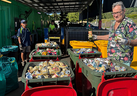 photo of Jonathan with recyclables